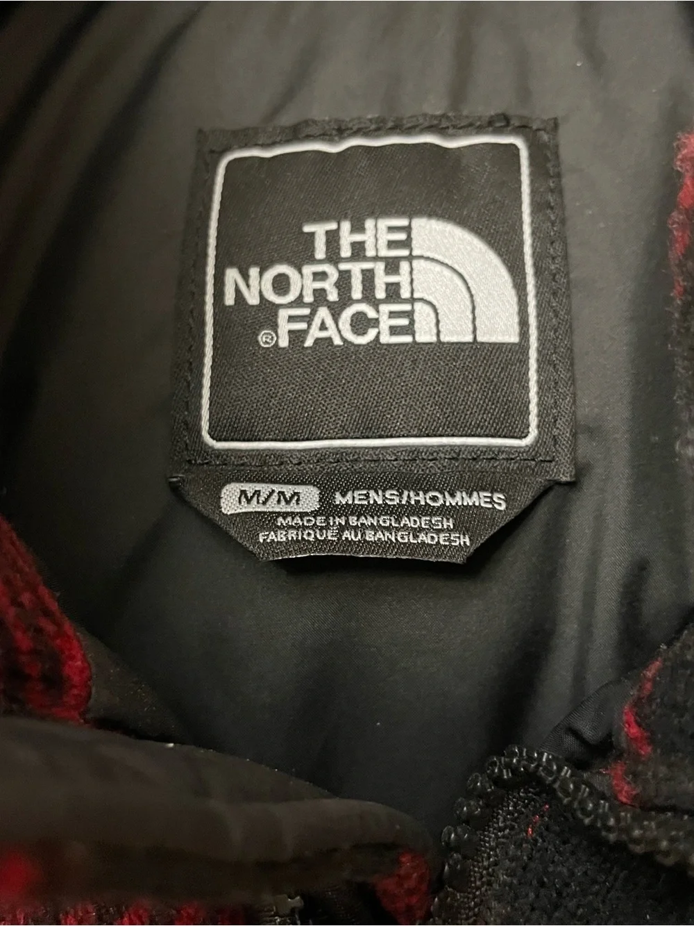 The North Face Nuptse 700 puffer vest Size M. buffalo plaid design on the yoke.